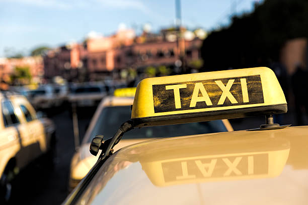 Taxis in a Moroccan town, North Africa